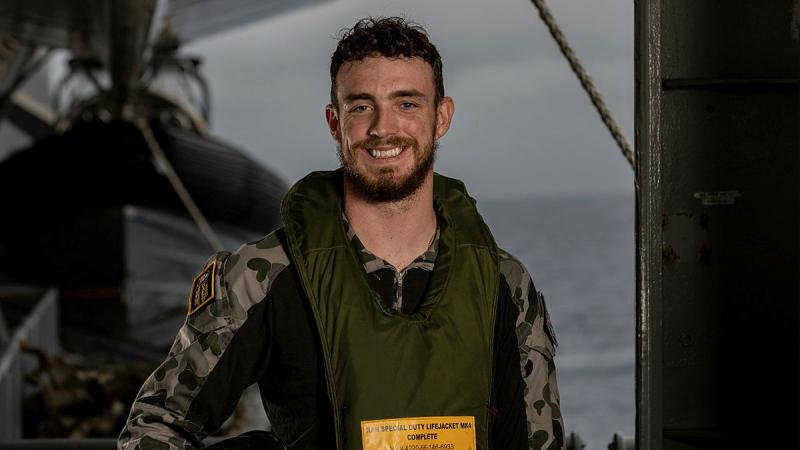 Able Seaman Boatswains Mate Corey Hardy on board HMAS Choules during the MH-60R Seahawk helicopter first of class flight trails. Photo: Able Seaman Rikki-Lea Phillips