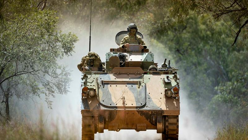 Armoured Personnel Carrier transports soldiers during Exercise Opie Trophy at Townsville Field Training Area. Photos: Lance Coporal Riley Blennerhassett