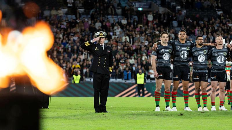 Chief of Navy, Vice Admiral Mark Hammond salutes to the Last Post sounds during an Anzac Round NRL game at Accor Stadium in Sydney, New South Wales. Photos: Leading Seaman Daniel Goodman