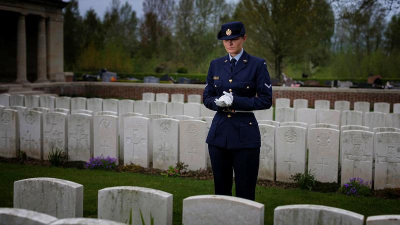 Leading Aircraftwoman Hunter Westbrook visits the resting place of her distant cousin, Private Victor Westbrook, in the Bailleul Communal Cemetery, Northern France. Photo: Sergeant Oliver Carter