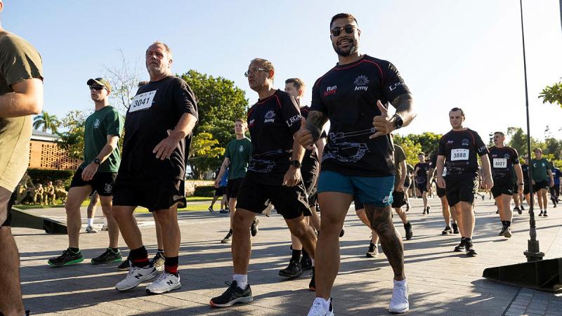 Soldiers and Townsville locals arrive at the finish line of Run Army Townsville 2023 at Jezzine Barracks in Townsville, Queensland. Photos: Lance Corporal Riley Blennerhassett