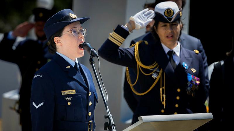 Leading Aircraftwoman Chloe Bruer-Jones a vocalist from the Air Force band sings the French national anthem during a commemoration held at the French cemetery in Gallipoli. Photo: Corporal Madhur Chitnis