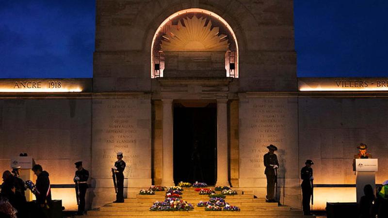 The catafalque party perform ‘rest on arms’ during the Anzac Day Dawn Service.