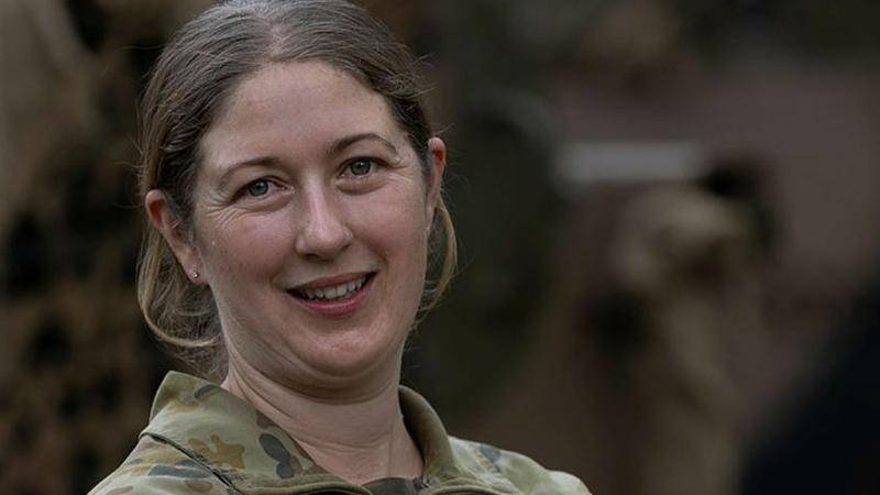Army Trooper Lisa McIntyre in front of a Bushmaster protected mobility vehicle during Exercise Waratah Run, Singleton, NSW. Photos: CPL Jacob Joseph