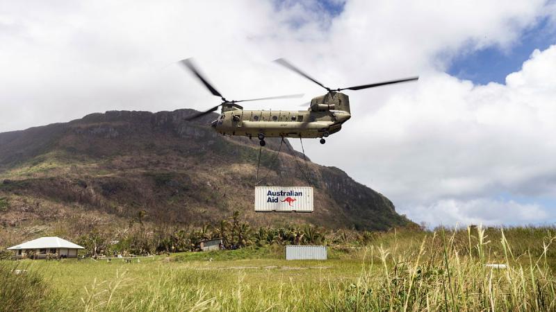 An Australian Army CH-47 Chinook helicopter delivers aid supplies to Futuna Island during Operation Vanuatu Assist. Photo: Leading Seaman Daniel Goodman