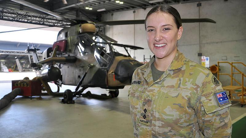 Lieutenant Catherine Gerrard stands in front an ARH Tiger at 1st Aviation Regiment, Robertson Barracks, Darwin, Northern Territory. Photo: Flight Lieutenant Nicholas O’Connor