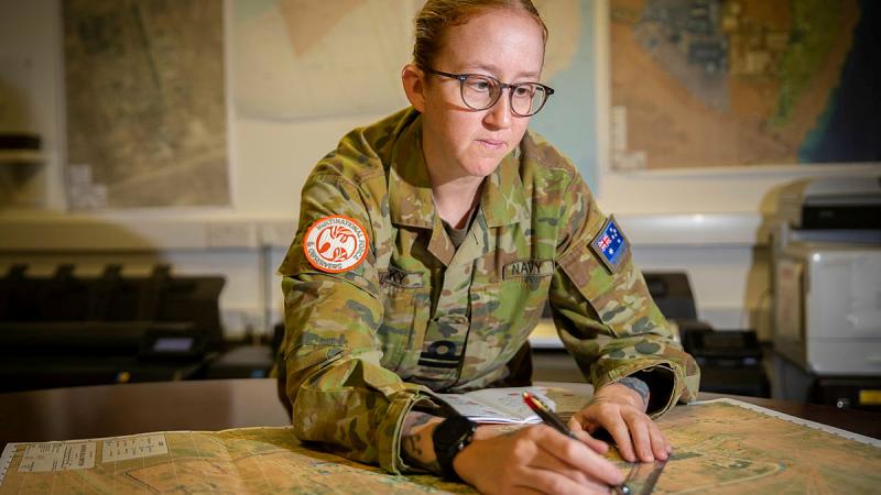 Lieutenant Sarah Lucinsky is conducting a route plan on Operation Mazurka. Photo: Corporal Melina Young