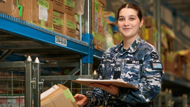 Aircraftwoman Indianna Biles checks the serial number of aircraft parts in the F-35A Lightning II warehouse at RAAF Base Williamtown in NSW. Photos: Leading Aicraftman Samuel Miller