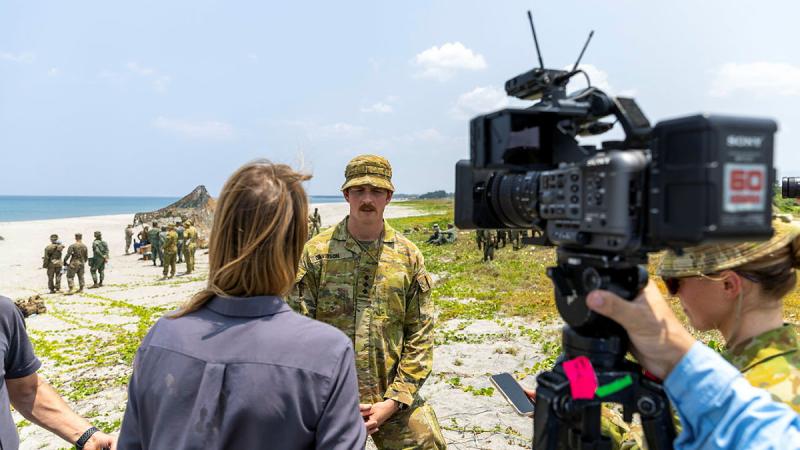 Australian Army Captain Joshua Davidson is interviewed by 60 Minutes Australia during a live fire demonstration at Naval Station Leovigildo Gantioqui. Photo: Leading Seaman Nadav Harel