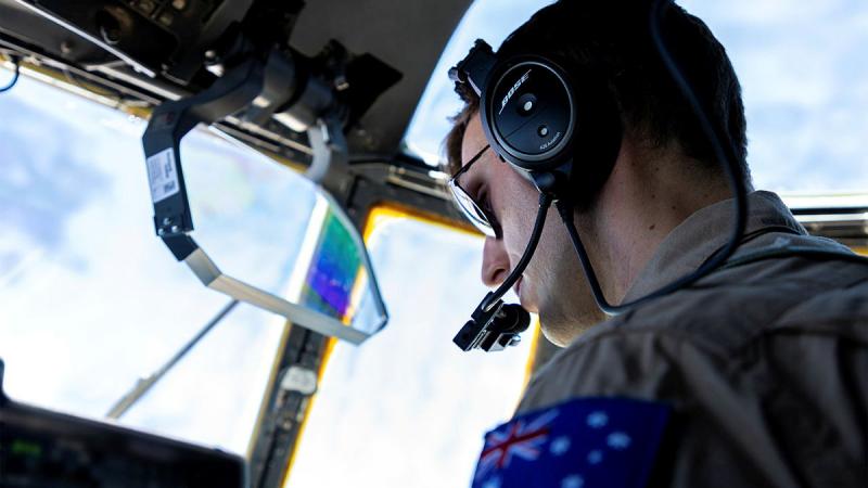 RAAF Flight Lieutenant David Holmes from 37 Squadron flies the C-130J Hercules aircraft assisting with the departure of evacuees from Port Sudan. Photo: Sergeant Jarrod McAneney