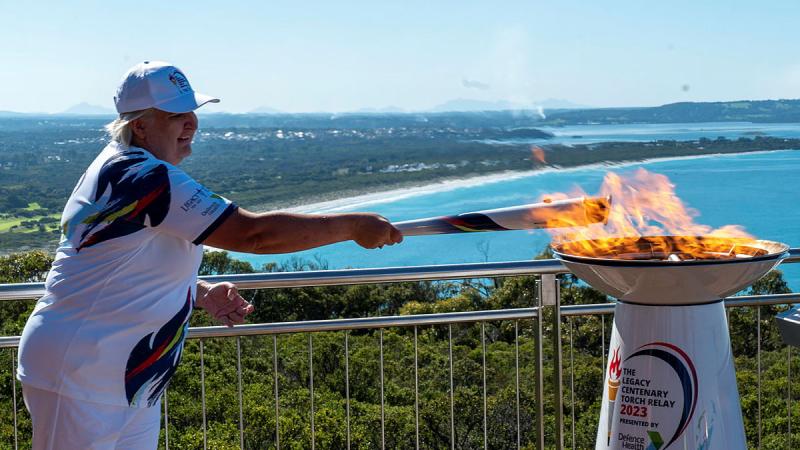 The flame is lit by a torch bearer as the Legacy Centenary Torch Relay begins its six-month journey across Australia in Albany, WA. Photos: Private Reece Oakes