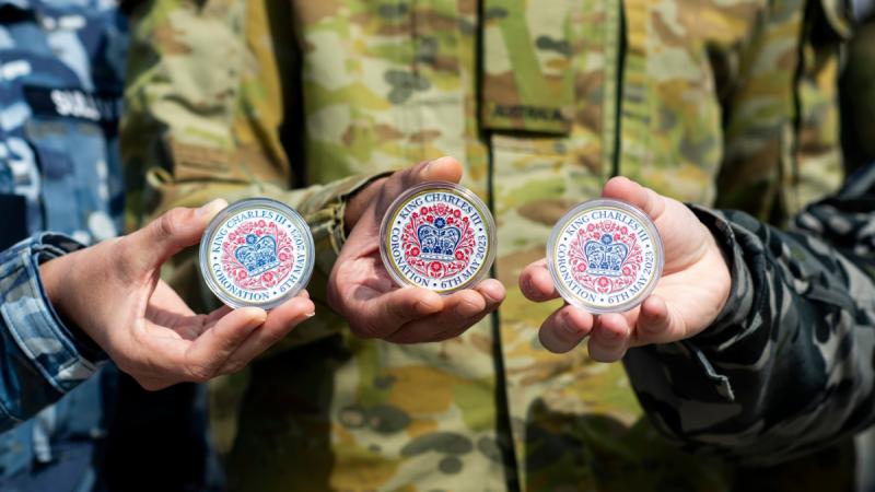 Commonwealth personnel are presented with a military coin to commemorate their participation in the Coronation of His Majesty The King, at Army Training Centre Pirbight, United Kingdom on May 5, 2023. Photos: Leading Aircraftwoman Emma Schwenke