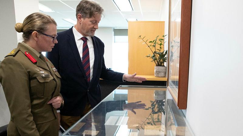 Head of Corp, Royal Australian Corps of Transport Brigadier Natasha Ludwig and Head of the Australian Army History Unit, Tim Gellel discuss the new exhibition ahead of its 50th anniversary, at Russell Offices, Canberra. Photos: Kym Smith