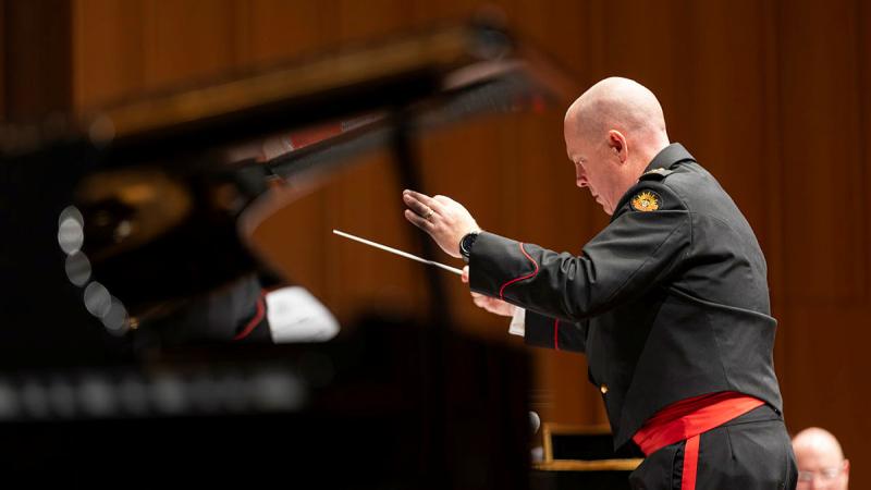 Army Officer Commanding and Music Director, Major Matthew O'Keeffe from the Band of the Royal Military College conducts during a concert at Llewellyn Hall. Photos: Leading Seaman Jarrod Mulvihill