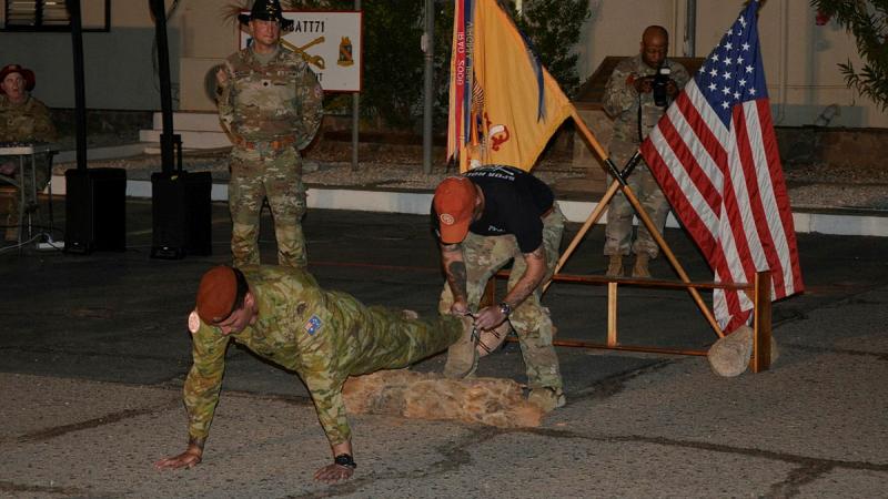 Australian Army’s Sergeant Matthew Blows receives his spurs after completing a US cavalry spur ride while deployed to the Multinational Force and Observers.