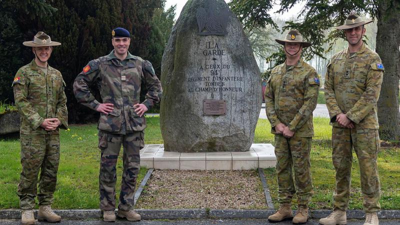Australian Army Lieutenant Colonel Adam Hepworth (left) and Colonel Robin Smith (second from right) meet with the French Army Lieutenant Colonel Matthias Leroy, supported by the Australian Army Liaison Officer to the French Army, Lieutenant Colonel Dean Kachab (right). Photo: Eloïse Marreau