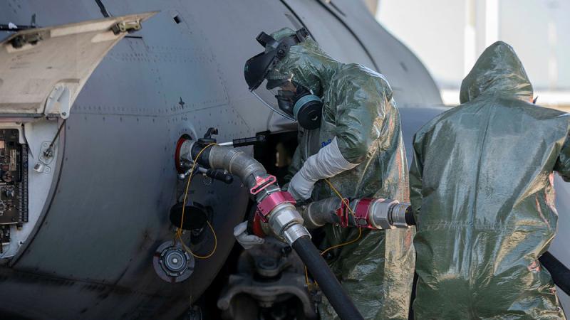RAAF personnel from 23 Squadron prepare to refuel a C-17A Globemaster III aircraft as part of Exercise Toxic Gauntlet at RAAF Base Amberley, Queensland. Photos: Leading Aircraftwoman Taylor Anderson