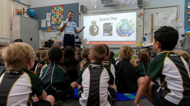 Flight Sergeant Daniel Hickey from Surveillance and Control Training Unit, educates the Kindergarten students about space. Photos: Leading Aircraftman Samuel Miller