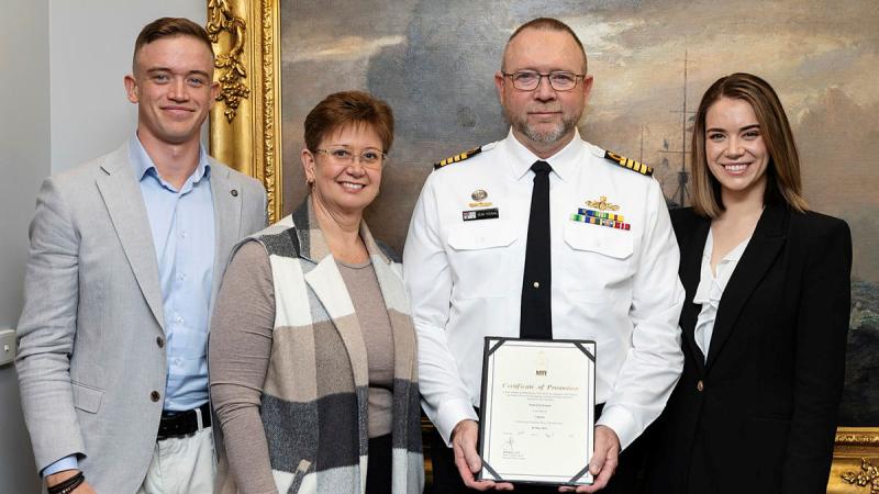 Captain Sean Feenan with his family after being promoted to captain at Russell Offices in Canberra. Photo: Petty Officer Jake Badior