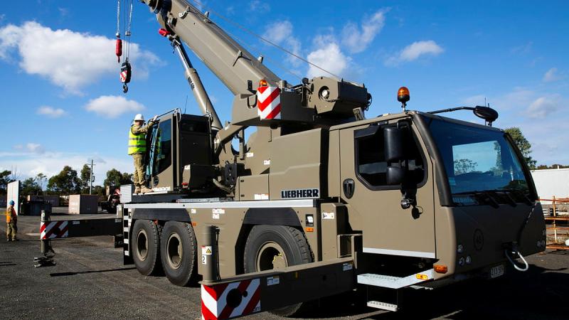 Australian Defence force personnel on a trial course to operate the Liebherr 1060-3.1 medium crane at the School of Military Engineering at Holsworthy Barracks. Photo: CPL Luke Bellman