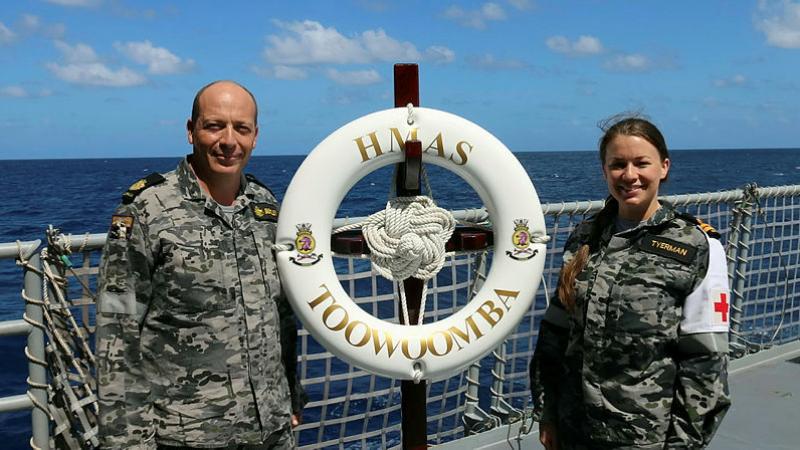Warrant Officer Bentley, left, and Lieutenant Tyermann on board HMAS Toowoomba. Photo: Able Seaman Shaun Siltic