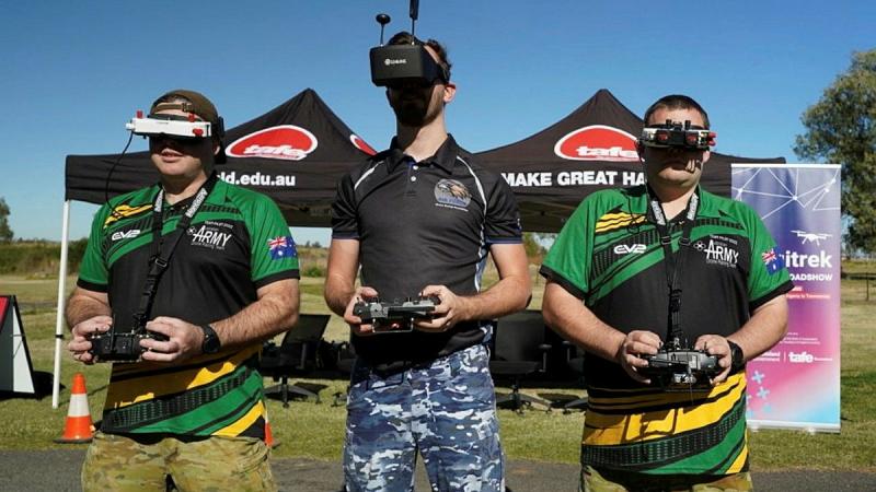 Drone racers, Sapper Alex Brown, Flight Lieutenant Jayden Hasemann and Lance Corporal Daniel McCullock fly their drones during the Queensland TAFE "DigiTrek" Roadshow. Photos: Captain Sarah Vesey 