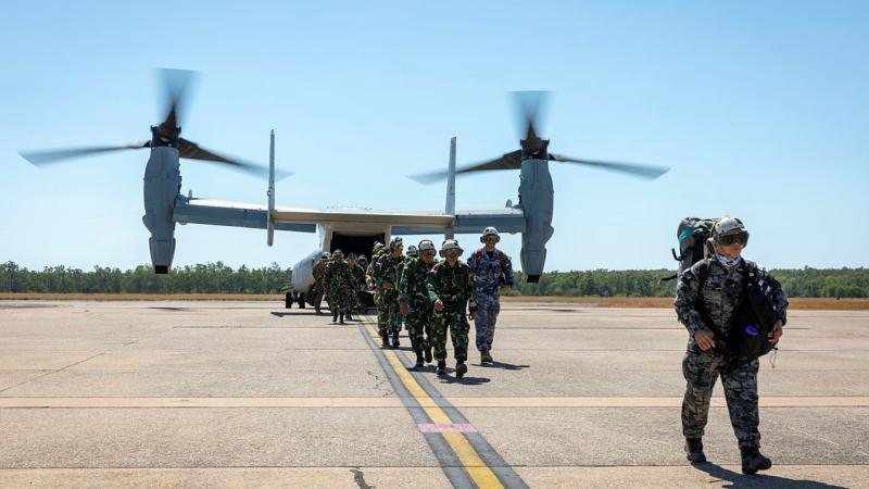 Military personnel from Australia, Indonesia and the United States disembark from a United States Marine Corps MV-22B Osprey at RAAF Base Darwin for Exercise Crocodile Response. Photo: Leading Seaman Leo Baumgartner