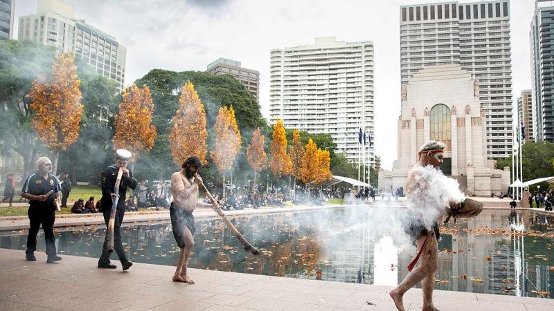 Local indigenous cultural performers conduct a smoking ceremony during the Indigenous Veterans Commemoration at Hyde Park, Sydney. Photos: Leading Seaman Susan Mossop