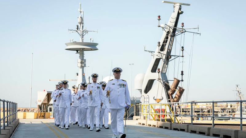 Commanding Officer HMAS Launceston Lieutenant Commander Adrian Hicks leads ship’s company on parade during a decommissioning ceremony at HMAS Coonawarra, Darwin. Photos: Leading Seaman Leo Baumgartner