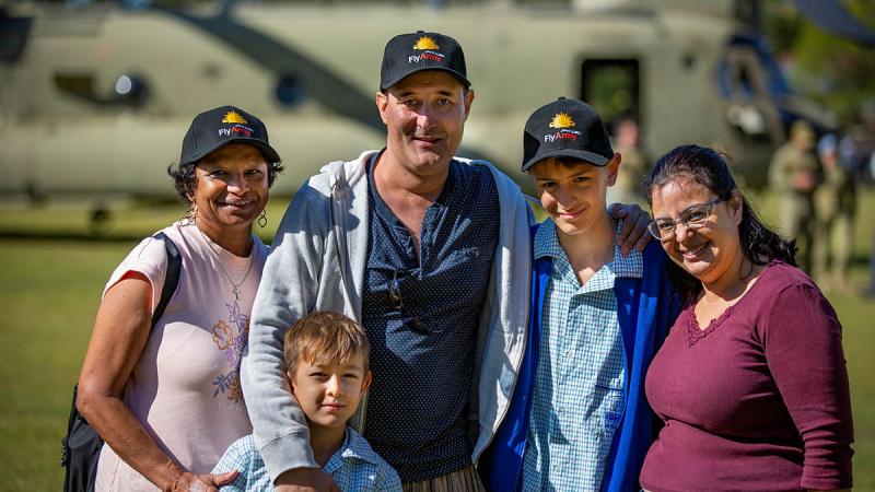 Myron Allen, with his family in front of an Australian Army CH-47 Chinook. Photos: Coporal Michael Rogers