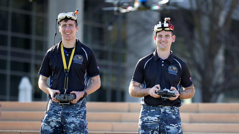 Vice President of the Air Force Drone Racing Association Officer Flight Lieutenant Nicholas Eberl (left) and President of the Air Force Drone Racing Association Officer Flight Lieutenant Jake Dell-O’Sullivan fly their racing drones. Photos: Private Nicholas Marquis