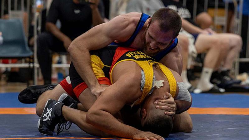RAN Able Seaman Kyle Mainey competes in the freestyle wrestling 92-kilograms division at the 2023 Senior National Championships at the Lang Park PCYC, Brisbane. Photos: Corporal Jacob Joseph