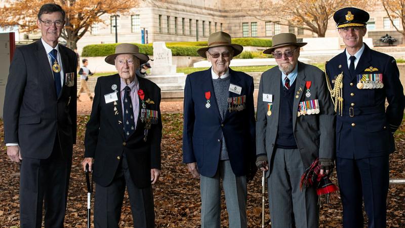 Air Chief Marshal (retd) Sir Angus Houston, Dr Ron Houghton, President of the Bomber Command Association of Australia, Bert Adams, Dr Max Barry, and Chief of Air Force Air Marshal Robert Chipman, gather for the Bomber Command Ceremony at the Australian War Memorial, Canberra. Photos: Leading Aircraftman Ryan Howell