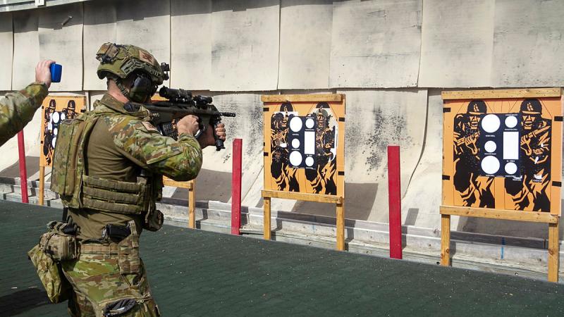 An Australian Army trooper from the 2nd Cavalry Regiment conducts a combat shooting serial on Exercise Beersheba Cup at Lavarack Barracks, Townsville, Queensland. Photos: Trooper Dana Millington