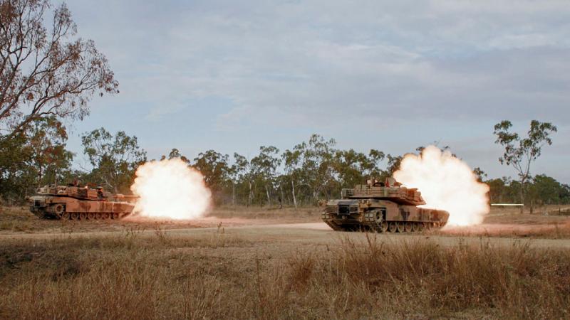 M1A1 Abrams Main Battle Tanks from the 2nd Cavalry Regiment conduct live-firing during Exercise Capital OTP at Townsville Field Training Area. Photo: Corporal Brandon Grey