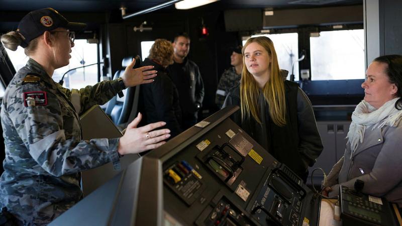 HMAS Sydney crew teaches visitors about the ship during Open Day. Photos: Tyson Burraston