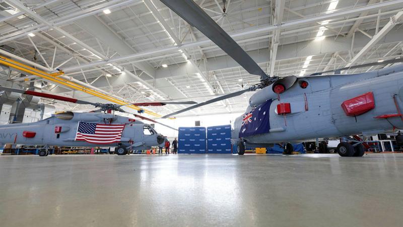 A pair of US Navy and Royal Australian Navy MH-60R Seahawk helicopters at the Sikorsky Australia facilities in Nowra, NSW. Photos: Petty Officer Peter Thompson