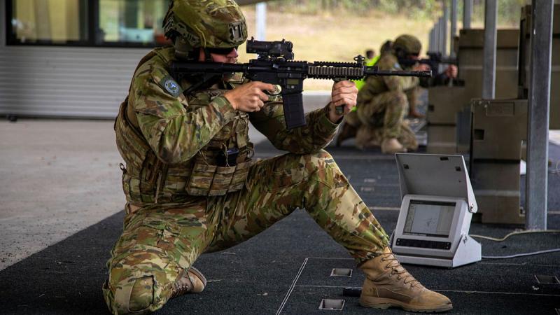 A soldier from 9th Force Support Battalion fires an M4 during a live-fire exercise at the Greenbank Training Area, Queensland. Photos: Captain Annie Richardson