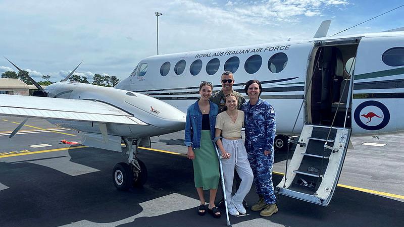 Flight Lieutenant Albert Van De Vyver with his wife and daughters at RAAF Base East Sale at a 32 Squadron Family Day. 