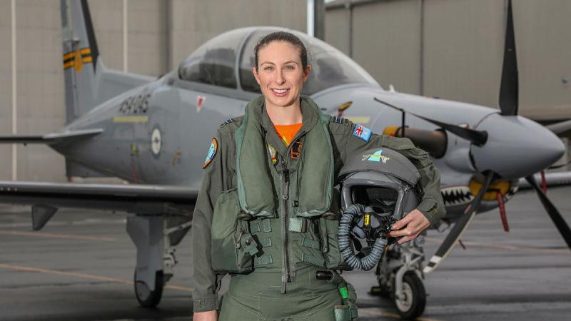  Aircraft Research and Development Unit Flight Test Engineer, Flight Lieutenant Stephanie Hume with a PC-21 on the flight line at RAAF Base Edinburgh. Photo: Corporal Brenton Kwaterski