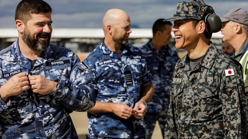 Japan Air Self-Defense Force, Major General Hiroaki Sakanashi, right, with Wing Commander Neil Bowen at 33 Squadron, RAAF Base Amberley, Queensland. 