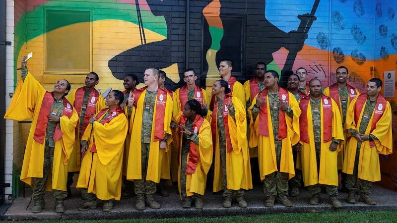 Australian Army recruits from the Army Indigenous Development Program (AIDP) pause for a selfie after marching out from their graduation parade at Defence Establishment Berrimah, Northern Territory. Photos: Captain Annie Richardson