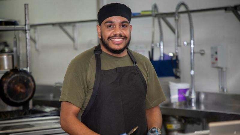 Leading Aircraftman David Skeen, 13 Squadron Chef, prepares food in the kitchen of the officers mess at RAAF Base Darwin in the Northern Territory. Photo: Sergeant Pete Gammie