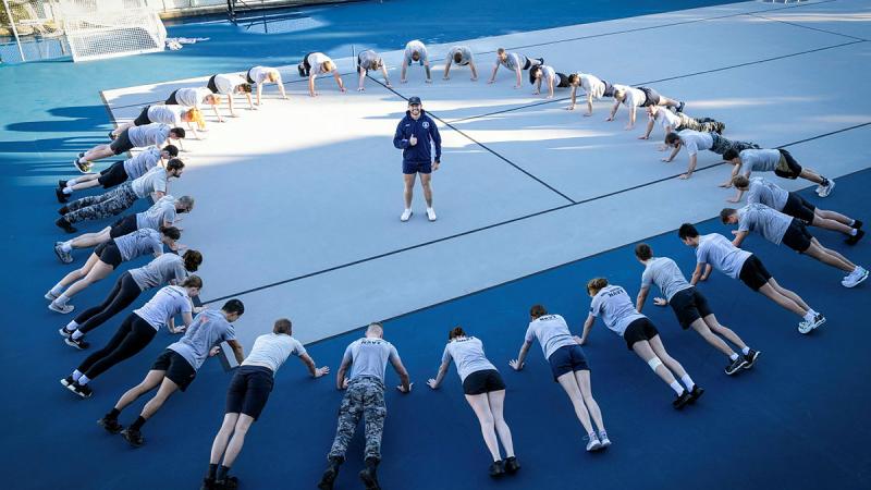 Personnel from HMAS Watson participate in Lifeline’s Push-Up Challenge. Photo: Leading Seaman Matthew Lyall