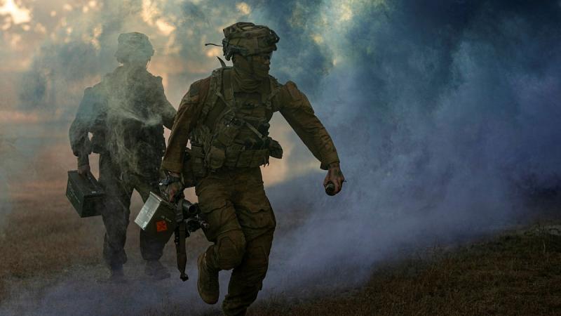 Australian Army riflemen from Battle Group Heeler deliver ammunition in a simulated urban assault during Exercise Southern Jackaroo, Townsville Field Training Area. Photos: Corporal Nicole Dorrett