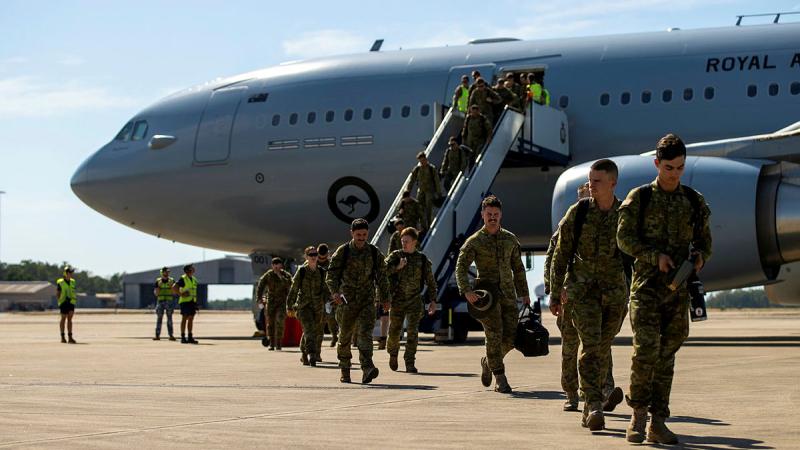Australian Army soldiers disembark a RAAF KC-30A Multi-Role Tanker Transport at RAAF Base Darwin after their deployment to the United Kingdom on Operation Kudu. Photo: Captain Annie Richardson