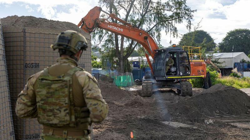 Australian Army soldiers from 6th Engineer Support Regiment fill Hesco barriers during Operation Render Safe, Nauru.