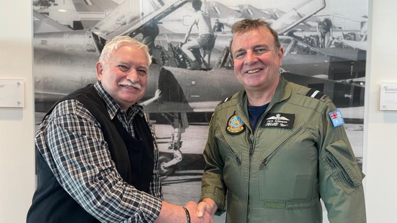 Air Commodore Pete Robinson Commander Air Combat Group shakes hands with Mr Gary Dobe