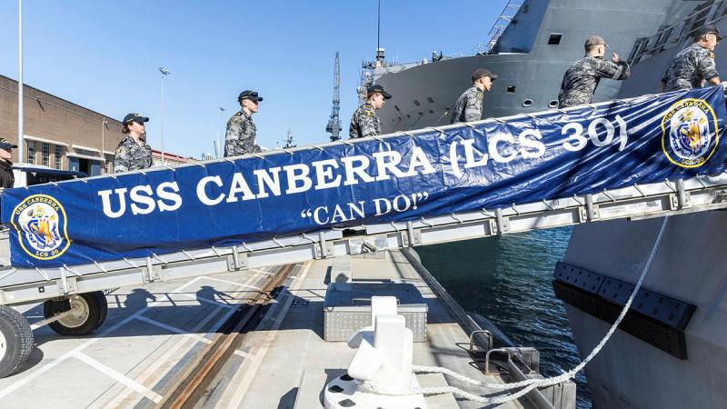 Members of HMAS Canberra embark USS Canberra while berthed alongside Fleet Base East, Sydney, NSW. Photos: Leading Seaman Matthew Lyall
