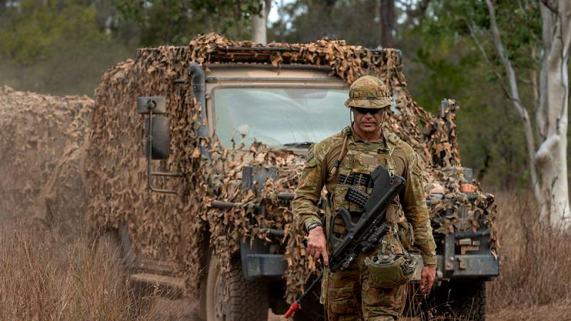 An Australian Army Lieutenant from the 7th Combat Signal Regiment guides a G-wagon during Talisman Sabre. Photos: Corporal Nicole Dorrett